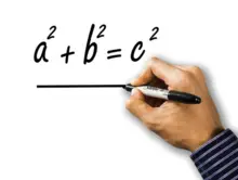 Teacher Writing on Whiteboard