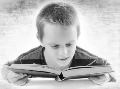 Kid Looking In Math Book